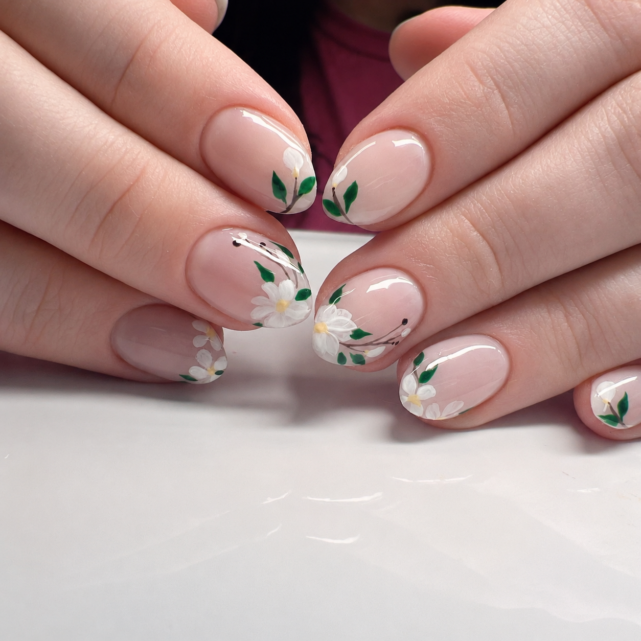 Delicate floral nude manicure by Nail Lit