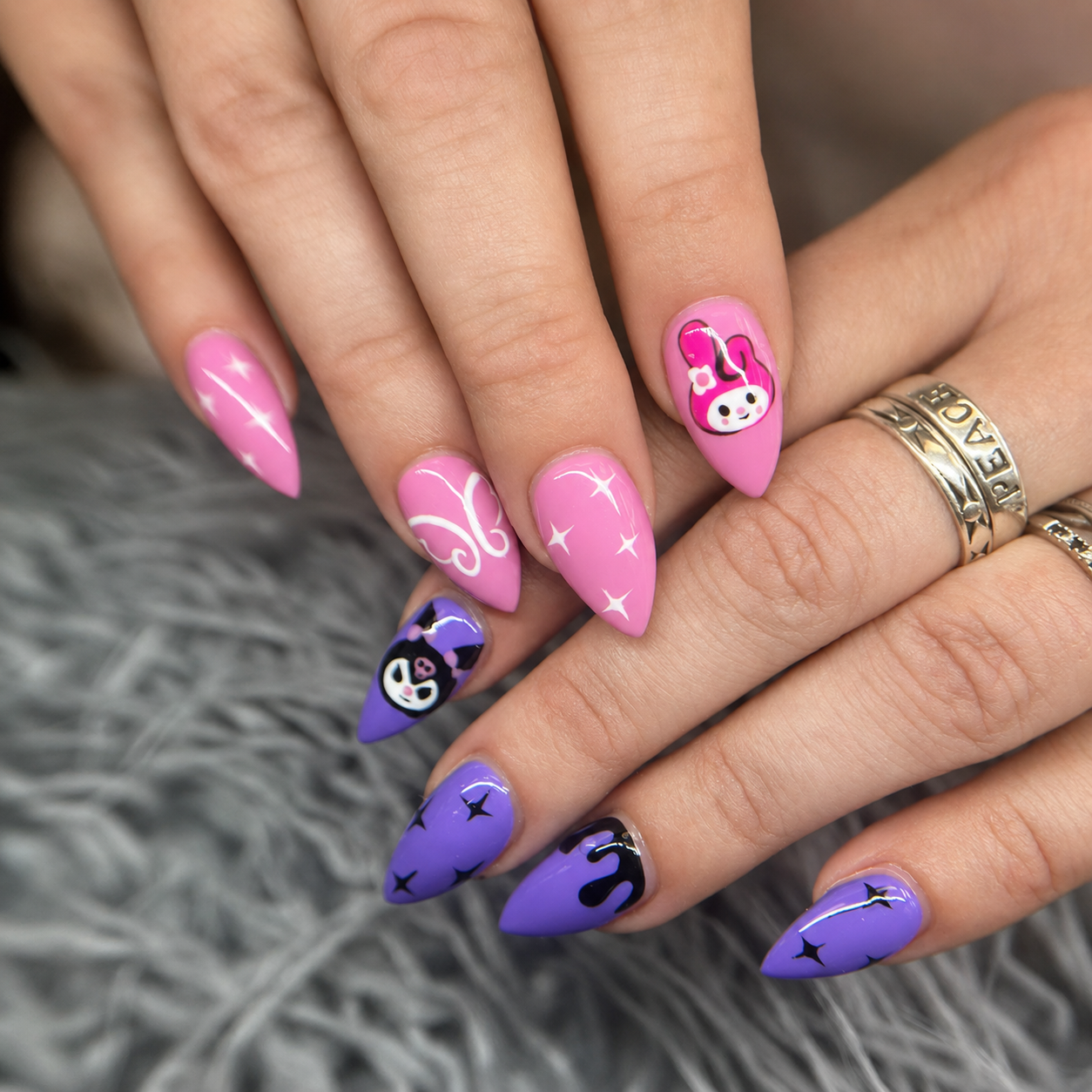 Pink and purple character nail art by Nail Lit