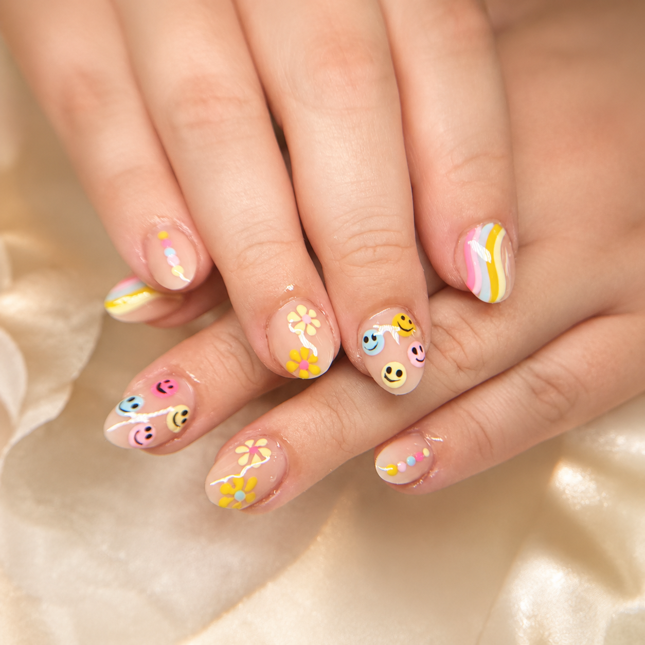 Smiley floral nail art by Nail Lit